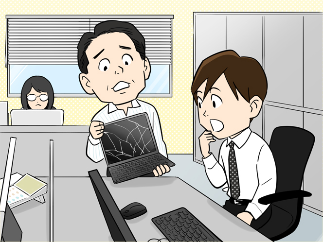 B課長が壊れたパソコンを持ってきている様子
