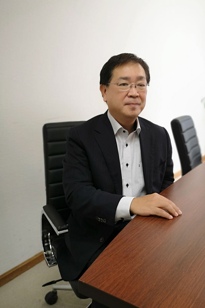 株式会社つうけん　白井 芳明 氏　写真