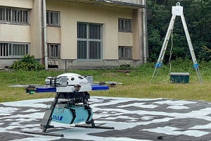 鹿児島県の離島へのドローンによる食品配送、映像解析AIで離発着ポートを無人監視