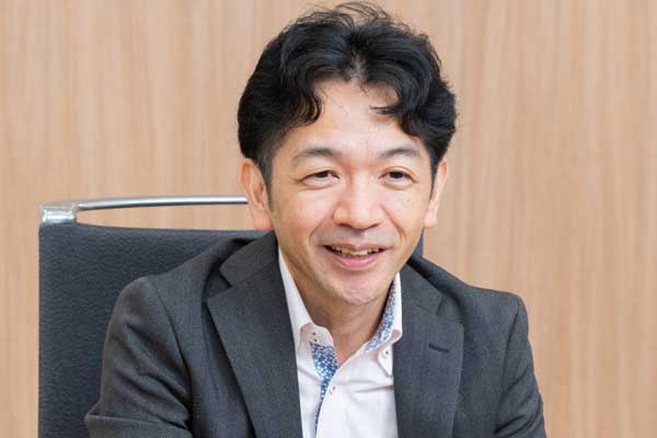 （写真）小島氏
