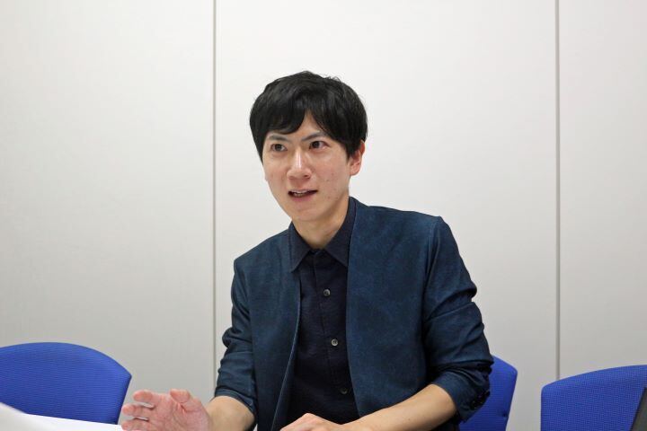 写真：石油資源開発株式会社 経営企画本部経営企画部 基幹システムグループ 内田優氏の顔写真