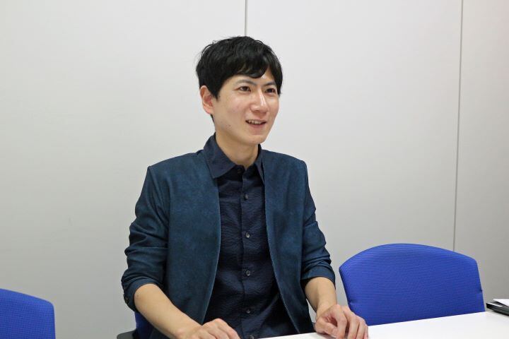 写真：石油資源開発株式会社 経営企画本部経営企画部 基幹システムグループ 内田優氏の顔写真