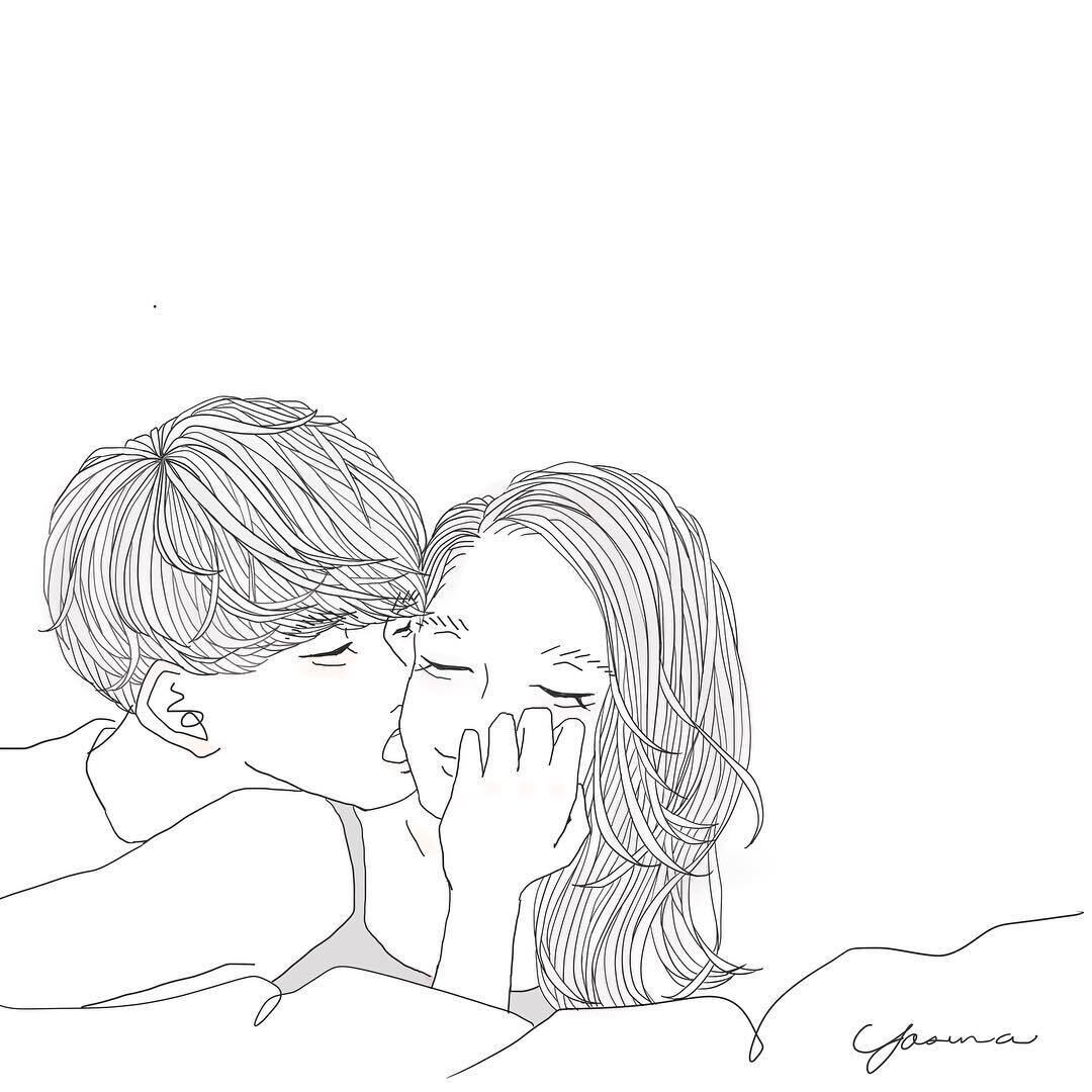 女性の頬へキスする男性