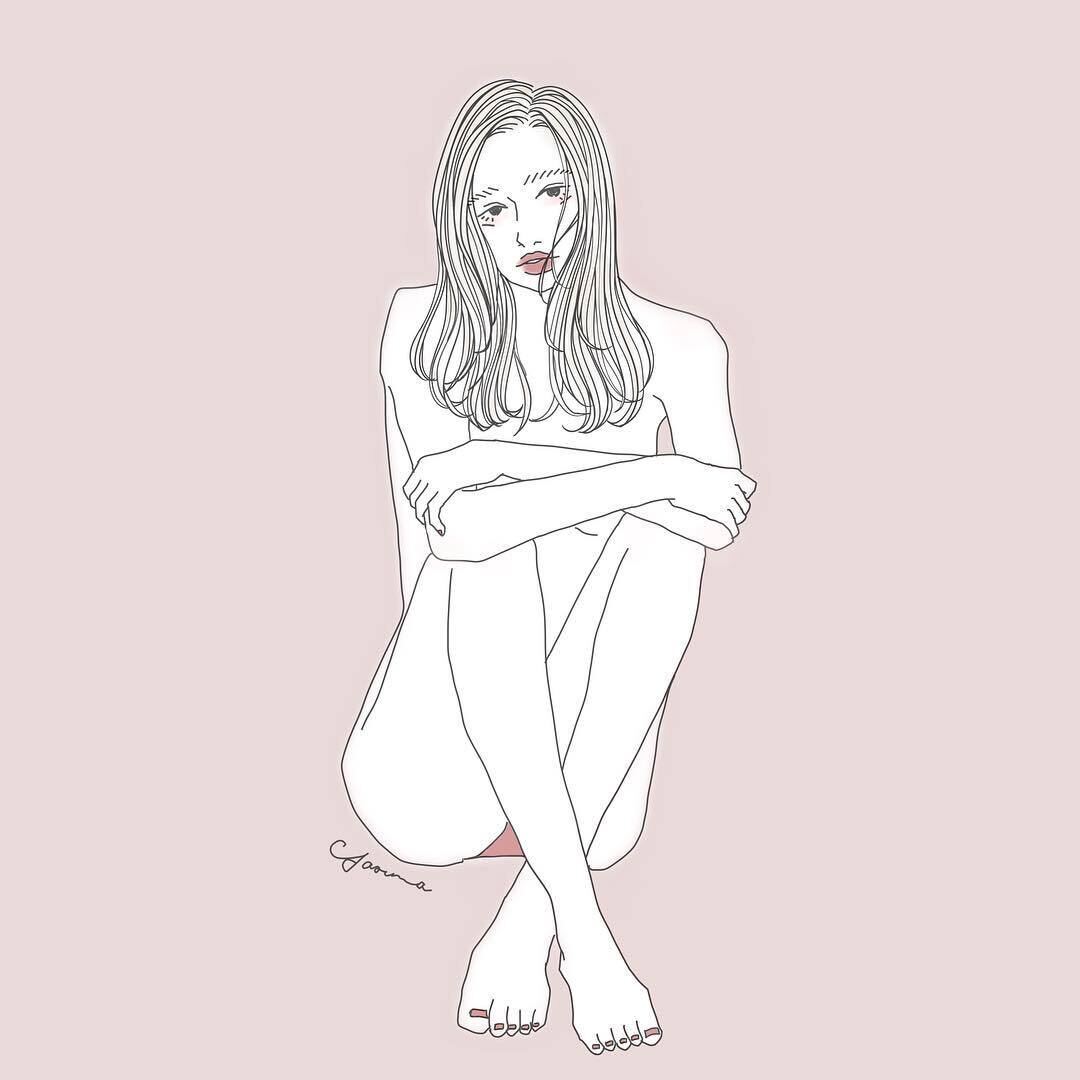 座る女性